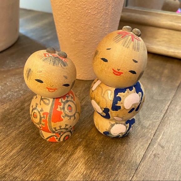 Vintage wood Japanese kokeshi dolls.
